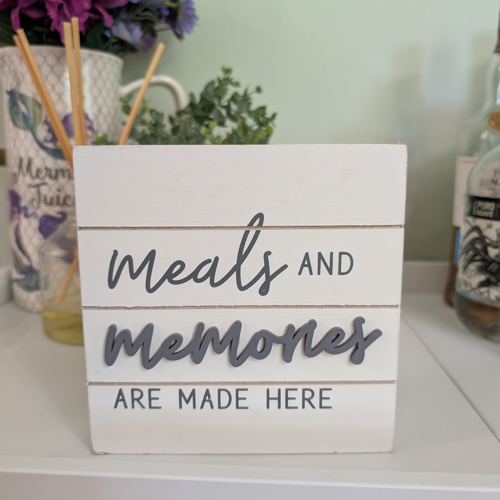 White and Gray Decorative Sign